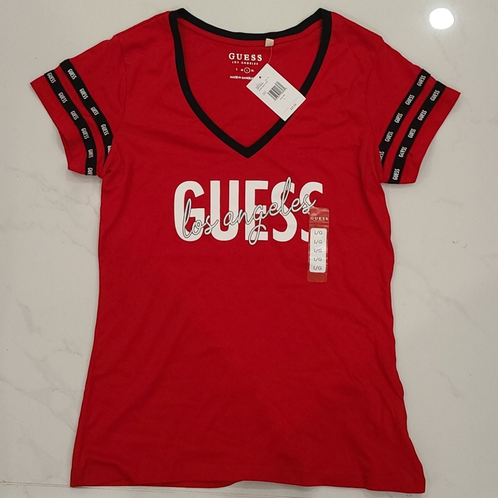 Guess  shirt size Large chest 18 in long 26 in